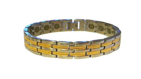 Pulsera magnética de acero inoxidable con líneas doradas y plateadas